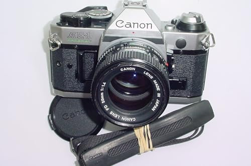 AE-1 Program 35mm Film SLR Camera with 50mm f/1.4 FD Lens Fully working