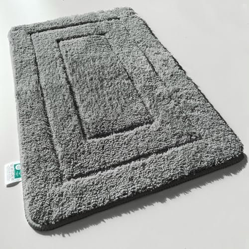 KARAT Badteppich Atlantis - extra flauschig & schnelltrocknend - Badezimmerteppich mit rutschsicherer Rückseite - Badematte Duschvorleger (60 x 100 cm, Dunkelgrau)