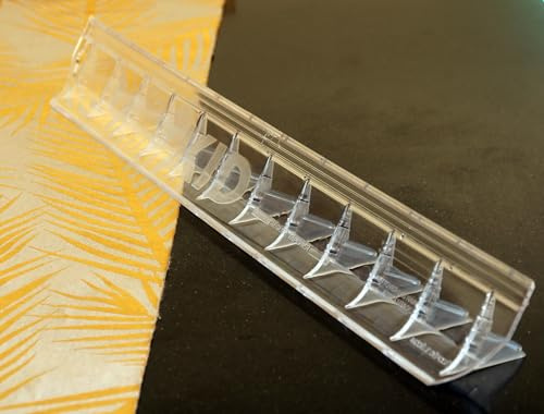 Règle à tapisser avec son cutter