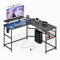 Mondeer L Shaped Gaming Desk, 130 x 130 cm Computer Desk with LED Lights 2 Power Outlets and 2 USB Ports, Reversible Corner Desk with Storage Shelf, for Home Office Bedroom, Black