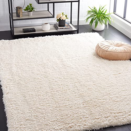 SAFAVIEH Flokati Shag Collection Area Rug - 6'7 x 9', Ivory, Solid Design, Non-Shedding & Easy Care, 2.75-inch Thick Ideal for High Traffic Areas in Living Room, Bedroom (FLK950B)