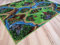 Kinderteppich Dino grün bunt Spielteppich Dinosaurier (300 x 400 cm)