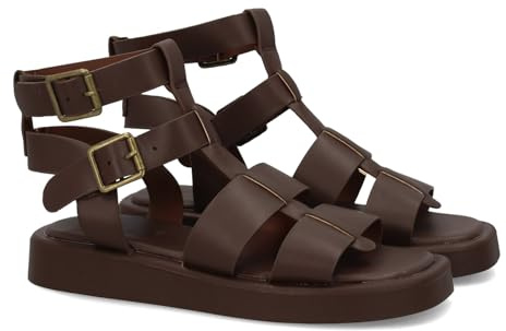 103360 Sandalia de mujer estilo romano con diseno de tiras anchas. Incorpora doble cierre con hebilla en el tobillo. Suela plana y comoda, ideal dia a dia en la temporada de verano Marron Talla 37