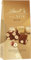 Lindt Schokolade NUXOR Milch | 103 g Beutel | Cremige Gianduja Milch-Schokolade mit ganzen, gerösteten Haselnüssen | Pralinen-Geschenk | Schokoladengeschenk