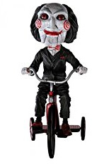 Figura cabezona triciclo Saw Head Knockers 20cm
