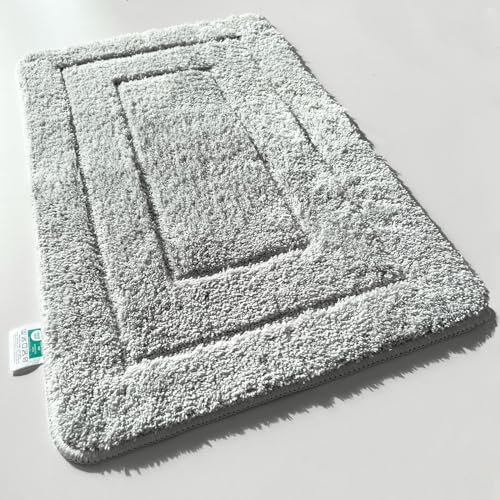 KARAT Badteppich Atlantis - extra flauschig & schnelltrocknend - Badezimmerteppich mit rutschsicherer Rückseite - Badematte Duschvorleger (60 x 100 cm, Silbergrau)