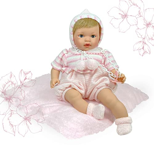 Muñeca Nines d'Onil. Mi bebito es una muñeca Que Abre y Cierra Sus ojitos. Su trajecito es de Punto Color Rosita. Lleva un cojín, y Chupete. Tamaño 40cm. Su Cuerpo es blandito. R/705