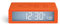 Lexon Flip+ Digital Alarm Clock for Bedrooms, Reversible On/Off Faces with Snooze function, LCD display & Touch Sensor Light, Radio Controlled & Battery Operated, Rubber - Orange