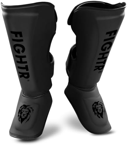 FIGHTR® Profi Schienbeinschoner extra Dick - mit perfektem Sitz und idealer Polsterung | Extra Dicker Schienbeinschutz für Kicks im Kickboxen, MMA, Muay Thai und Kampfsport (All Black, XL)