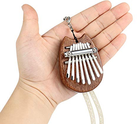 Alnicov Piano de pulgar Kalimba de 8 teclas, piano de dedo de madera maciza Super MiNi con cordón, adecuado para principiantes en cumpleaños, Navidad y otras ocasiones (forma de oreja de gato)