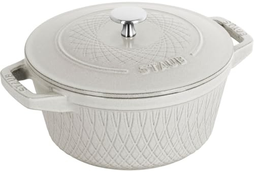 staub twister cocotte 24cm white 3.8l cast iron material matte black inner enamel. lid with aroma rain structure. suitable for all types of hobs, incl. induction. ovensafe. grill safe.