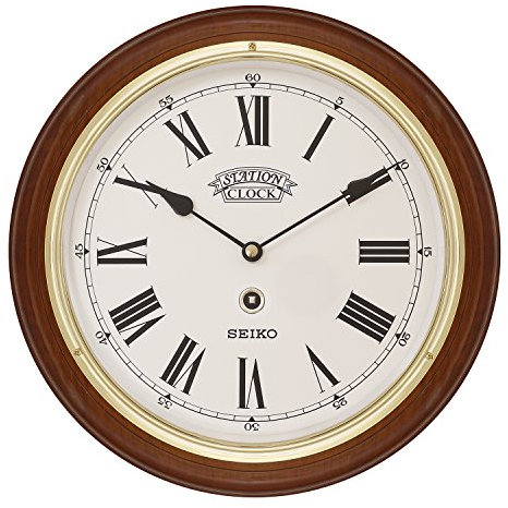 Seiko Dark Wooden Quartz/Battery Round Station Wall Clock with Gold Coloured Bezel, White Dial & Roman Numerals. QXA143B