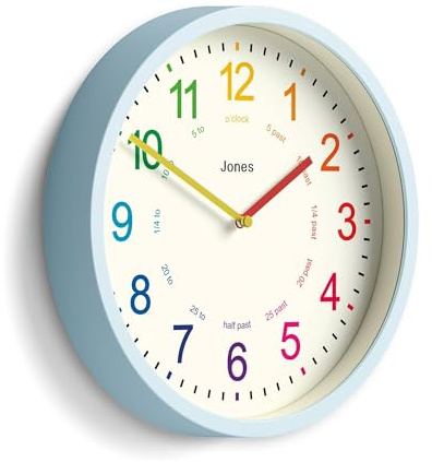 Jones Clocks® Kids wall clock | Small modern children’s nursery clock | 25cm | Pale blue | Colourful dial for learning to tell the time