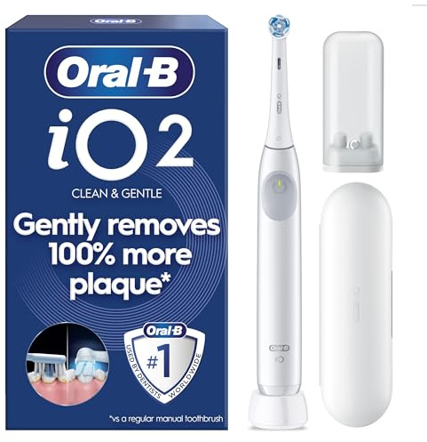 Oral-B iO2 Electric Toothbrush, 1 Gentle Care Toothbrush Head, 1 Travel Case, 1 Travel Refill Holder, Toothbrush for Adults (Simple White), Designed by Braun, 2 Pin Plug
