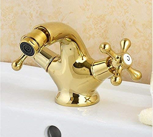 Grifo de bidé dorado con asas dobles de latón antiguo para una experiencia de baño lujosa y elegante