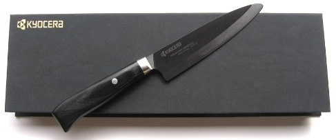 Kyocera JPN-130 - Coltello da prosciutto in ceramica, lama 13 cm, manico in legno di Pakka, con protezione lama