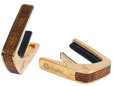 Thalia Premium Series Kapodaster med guldfinish och Curly Hawaiian Koa Honeycomb-inlägg