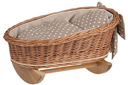 Cuna de madera con un bonito lazo decorativo.