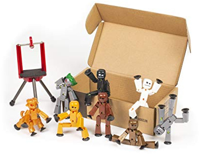 StikBot Zing - Juego de 8 figuras de acción coleccionables transparentes y trípode para teléfono móvil, crea animación Stop Motion, ideal para niños a partir de 4 años