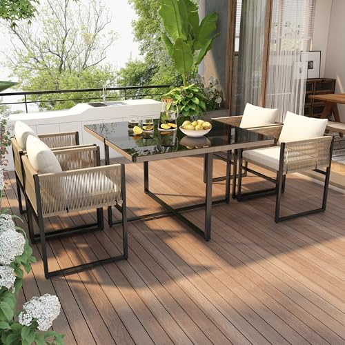 Merax Juego de muebles de jardín 4 sillas apilables y mesa de comedor, grupo de comedor de jardín, conjunto de asientos para exteriores con cojín, marco de metal, tablero de cristal de seguridad,