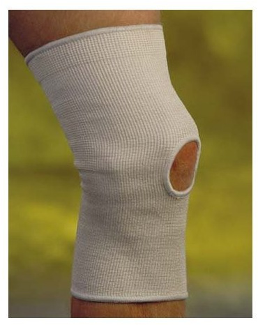 Knee Support - Medium Soft beige knitted elastic with open patella. Slips on easily, provides compression.