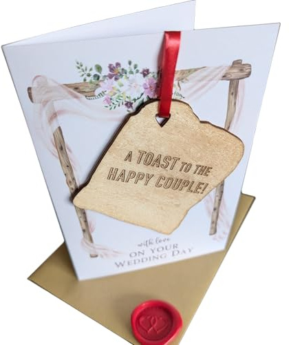 Wedding Card with a toast shaped Pendant on the front with Detailed Engraving and the words A toast to the happy couple engraved