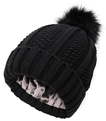 TOEECY Bonnet Femme Hiver Chaud Bonnet Tricoté avec Pompon en Fausse Fourrure Épais Souple Tricot Chapeau Satin Doublé Protéger la Coiffure Mode Slouchy Bobble Beanie (Noir)