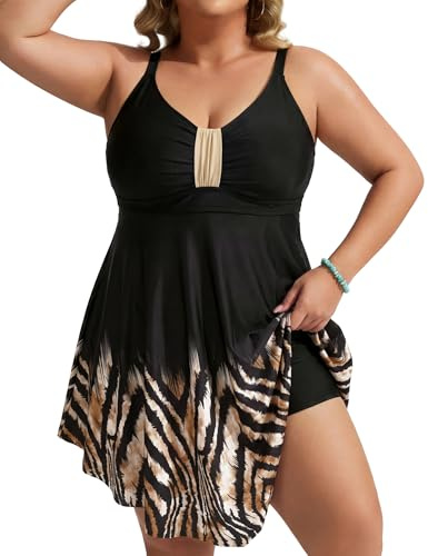Hanna Nikole baddräkt för damer i plus size – shaping baddräkt med figurformande effekt, rynkad design och mjukt material. Strandmode med badshorts och justerbara axelband.