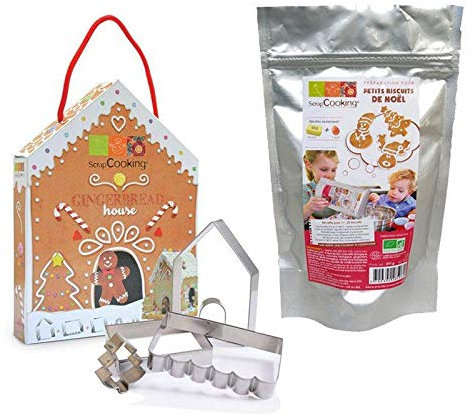 Set di casa di marzapane - preparazione di frese e biscotti