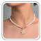 Yheakne Boho Daisy Flower Pendant Necklace Enamel Daisy Flower Necklace White Seed Beaded Necklace Chain Rice Bead Choker Necklace Jewelry for Women