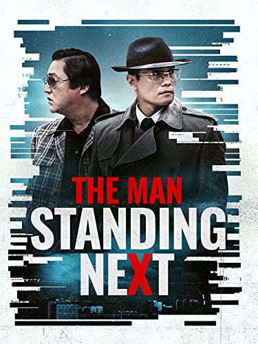 The Man Standing Next