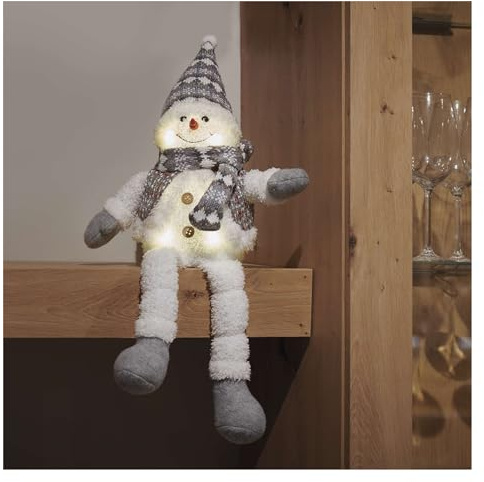 EMOS Pupazzo di neve a LED con 6 LED, decorazione natalizia, pupazzo di neve seduto con veste e bersaglio, figura invernale illuminata con gambe sospese, 21 x 31 cm, luce bianca calda, funzionamento a