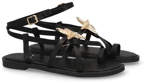 99505 Sandalia plana romana diseno de estrella de mar en empenie. Detalle metalico, cierre de hebilla, estructura de tiras finas y planta acolchada, ideal para mujer primavera verano Negro Talla 38