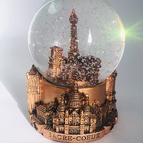 VIANAYA Boule de Neige Paris Tour Eiffel - Base résine avec Monuments en 3D et Globe en Verre avec Paillettes Scintillantes -Couleur cuivre - Taille Moyenne (Hauteur 11CM)