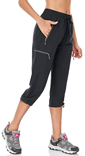 BAYGE Pantalones de Senderismo para Mujer 3/4 Ligeros de Verano Pantalones de Trekking Outdoor Transpirables, de Secado Rápido y a Prueba de Agua con Bolsillos con Cremallera, Negro, M