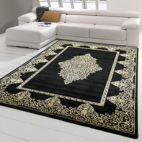 Teppich-Traum moderner Wohnzimmerteppich mit goldenen Verzierungen auf schwarz, Größe 120x170 cm