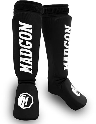 MADGON Espinilleras Kick Boxing Ajuste y Acolchado Ideal – Protección de Espinillas Baja Transpiración – Espinilleras Muay Thai – Protectores de Piernas para Artes Marciales – Incluye Funda