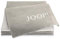 Joop!® Uni-Doubleface I flauschig-weiche Kuscheldecke Sand-Pergament I Wohndecke aus Baumwollmischgewebe in beige I Tagesdecke 150x200cm | nachhaltig produziert in Deutschland I Öko-Tex Standard 100