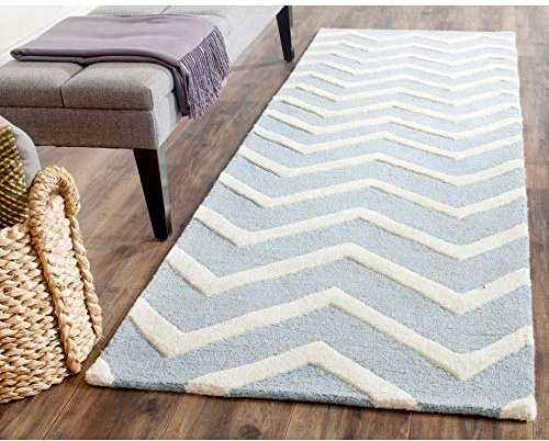 SAFAVIEH Tapis Contemporain Pour Salon, Salle à manger, Chambre à coucher - Cambridge Collection, Tapis à poil court, Bleu et Ivoire, 76 X 244 cm