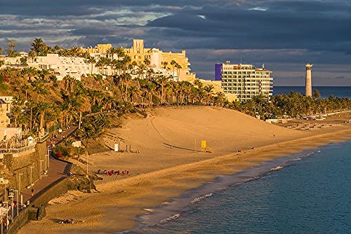 ArtExpert Canary Islands-Fuerteventura Island-Morro Jable-high angle view of Playa de la Cebada beach-sunset by Walter Bibikow - 18x12 Art Print Poster