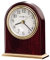 Howard Miller Monroe Reloj de Mesa 645-446 - Decoración Moderna para el hogar, Reloj en Forma de Arco, Acabado de Palisandro Brillante con Base de Metal con Acabado de latón, Movimiento de Cuarzo