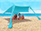 Strandzelt Sonnenschutz Strand zelte strandmuschel Muschel UPF50+ mit Sandschaufel, Erdnägeln und Stabilitätsstangen, Outdoor-Schatten für Campingausflüge, Angeln, Hinterhofspaß oder Picknicks