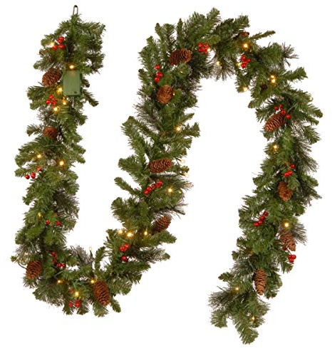 National Tree Company 9 ft Pre-Lit Crestwood Spruce Artificial Christmas Garland, Christmas Decoration with Glitter, Pinecones, Red Berries, 50 Warm White LED Lights, 180 Tips, Timer, Green
