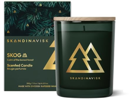 Skandinavisk SKOG doftljus guld Edition. Doftnoter: tallnålar och grankottar, björksaft och liljekonvalj. 200 g.