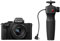 Panasonic Lumix DC-G100DVEGK Micro Four Thirds spiegellose Kamera mit Lumix G Vario 12-32 mm F3.5-5.6 Objektiv & DMW-SHGR2 Stativgriff, 20,3 MP, 4K 30p/FHD 60 Video, Vlog-Cam, USB-C-Ladung, Schwarz