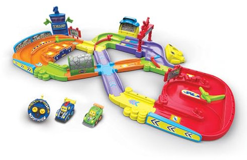 VTech - Tut Tut Bolides, Mon Premier Circuit Télécommandé avec Voiture RC Simon Super Champion et Voiture Léo Bolide Turbo, 11 Zones Magiques, Cadeau Enfant de 1 an à 5 Ans - Contenu en Français