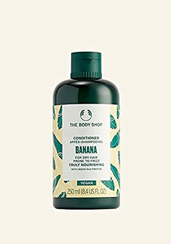 The Body Shop Banana Truly Nourishing Conditioner für trockenes Haar, das zu Frizz neigt, beschädigt, vegan, 250 ml