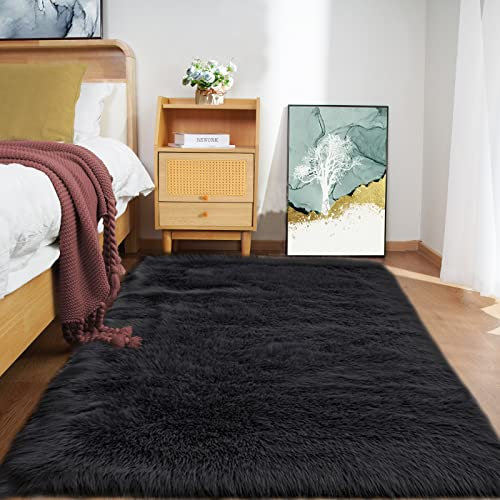 Goolela Tapete rectangular de pelo sintético mullido de 4 x 6 pies, para sala de estar, lavable, dormitorio, esponjoso, piel de oveja sintética, decoración del hogar, color negro