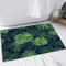 FSDGY Badvorleger Fußmatte Flauschig Teppich Badezimmerteppich Duschmatte für Bade & Wohnzimmer Schlafzimmer,Tropisches Muster mit grünen Monstera-Palmenblättern auf dunklem Hintergrund.,40x60 cm
