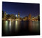 Wallario Herdabdeckplatte/Spritzschutz aus Glas, 1-teilig, 60x52cm, für Ceran- und Induktionsherde, New York Skyline - Brooklyn Bridge und Manhattan am Abend